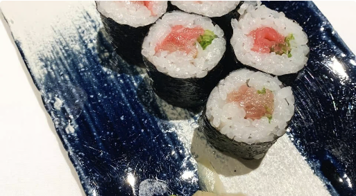 Beef Roll - Tender beef wrapped around vegetables with teriyaki glaze